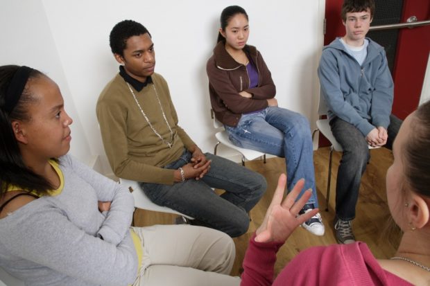 Young people in a meeting.