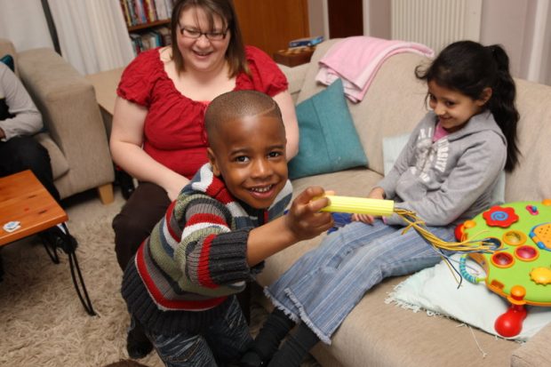 Children playing in a cosy room