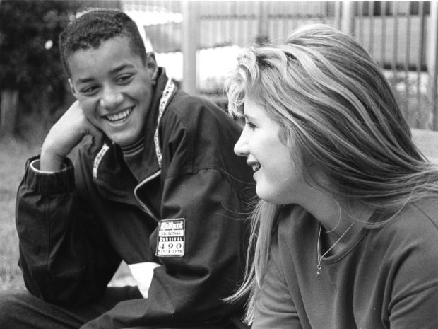 Two teenagers having a conversation